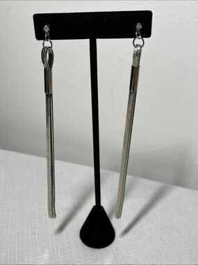 Long silver-tone snake chain tassel earrings
multi-strand & crystal studs